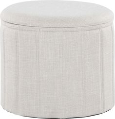 an upholstered round ottoman sits on a white background, with the lid closed