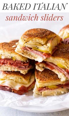 there are several sandwiches stacked on top of each other with the words baked italian sandwich sliders