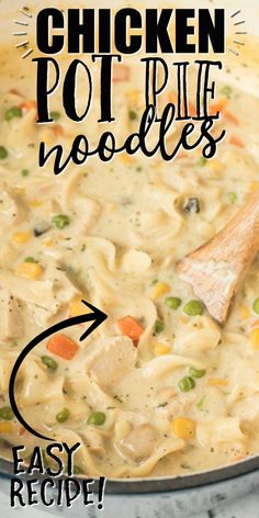 chicken pot pie noodle soup recipe in a skillet with a wooden spoon on the side