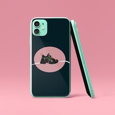 a phone case with a cat on it and a pen sticking out of the back