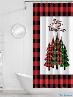 a bathroom with a christmas tree shower curtain