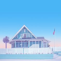 a blue house with a white picket fence and american flag in the foreground on a sunny day