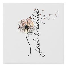 a dandelion with the words happy new year written in black ink on a white background