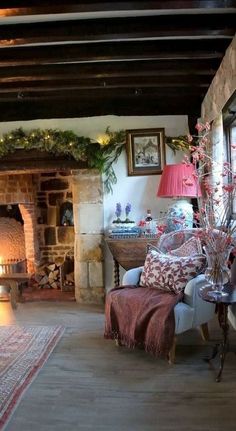 a living room filled with furniture and a fire place