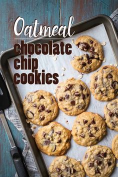 chocolate chip cookies sitting on top of a pan