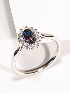 18K white gold ring with natural Black opal and Diamonds gemstone origin - Australia opal measurements - 0.079 х 0.16 х 0.28 in / 2 х 4 х 7 mm opal weight - 0.71 carats ring size - 7 US ring weight - 2.94 grams ref No 12052 Feel free to contact us with any questions or for additional pictures or videos. We ship our jewelry worldwide - for our customers it is free of charge and fully insured (with tracking). To ensure that everything arrives securely and unharmed at the recipient, we only commiss Black Opal Engagement Ring, Resize Ring, Opal Engagement Ring, Modern Engagement Rings, Opal Engagement, Engagement Style, Engagement Rings Opal, Payment Plan, Gifts For My Wife