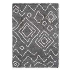 a gray and white rug with an abstract design