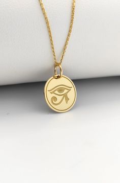 Welcome to ElegantGoldJewels,  Find all the information you need about your charm: Material of pendant: 14K Solid Gold Stamp: 585 (14K) Thickness: 0.5mm Jumpring Diameter: 4mm The pendant is available in 6 sizes: - 13mm / 0.52 inches - 15mm / 0.59 inches - 18mm / 0.70 inches - 20mm / 0.78 inches - 22mm / 0.86 inches - 24mm / 0.94 inches - 26mm / 1.02 inches - 28mm / 1.10 inches - 30mm / 1.18 inches Chains Information: Rolo Chain: -14K Real Gold - 0.70mm thick - Spring Ring Clasp - 16 inches / 40 Horus Necklace, Eye Of Horus Necklace, Ancient Egyptian Symbols, Egyptian Eye, Symbol Of Protection, Eye Of Ra, Egyptian Symbols, Silver Eye, Eye Of Horus