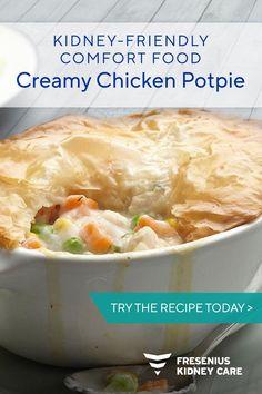 a chicken pot pie on a plate with a fork and spoon in front of it that says, kidney - friendly comfort food creamy chicken potpie try the recipe today