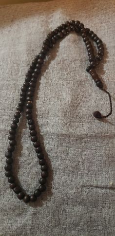 Tasbih-subha-rosary beads, Muslim, Islam 99 wooden beads In green and red beads. Traditional Handmade Brown Rosary, Traditional Brown Rosary With Round Beads, Traditional Beaded Brown Rosary, Traditional Brown Beaded Rosary, Red Beads, Rosary Beads, Green And Red, Red Bead, Home N Decor