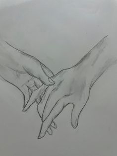 two hands touching each other with their fingers