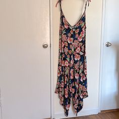 Rand New Never Worn One Size Fits All Asymmetrical Hem Wide Leg Loose Fit Strechy Boho Style Multicolor Flower Pattern Spaghetti Adjustable Straps Poly Elastane Mixed Very Comfortable For Summer Sleeveless Rayon Jumpsuits And Rompers For Beach, Sleeveless Rayon Jumpsuit For The Beach, Sleeveless Rayon Jumpsuit For Beach, Summer Beach Rayon Jumpsuits And Rompers, Summer Beach Jumpsuits And Rompers In Rayon, Summer Floral Print Jumpsuits And Rompers For Loungewear, Sleeveless Floral Print Jumpsuits And Rompers For Beach, Blue Tropical Print Jumpsuits And Rompers For Beach, Sleeveless Tropical Print Jumpsuits And Rompers For Beach