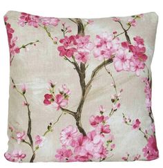 a pillow with pink flowers on it