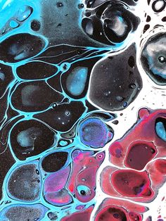 an abstract painting with blue, red and black colors on it's surface that looks like liquid