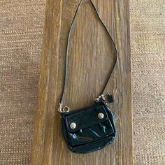 Black Patent Leather Coach Purse. Approximately 8 In. Wide And 7 In. Tall. Flap Enclosed Pocket On The Front. Strap Hangs Approximately 22 Inches. Practically Brand New! Black Coach Purse, Leather Coach, Bags Black, Coach Purse, New Wardrobe, Coach Purses, Black Patent Leather, Coach Bags, Mini Bag