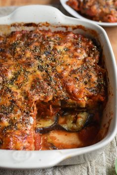 a casserole dish filled with meat and vegetables