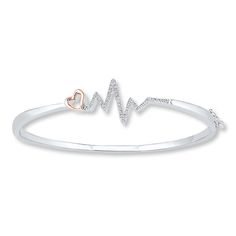 This whimsical sterling silver bangle bracelet for her features a dainty 10K rose gold heart alongside a diamond-studded heartbeat design. The bracelet has a total diamond weight of 1/10 carat. Heartbeat Bracelet, Bracelet For Her, Jewelry Advice, Silver Bangle Bracelet, Sterling Silver Bangle Bracelets, Sterling Silver Bangle, Rose Gold Heart, Silver Bangle Bracelets, Sterling Silver Bangles