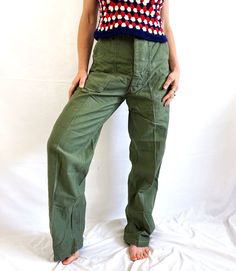 Great vintage condition Men's Cotton Sateen Trousers, OG -107 Button fly Size 30 X 33 Lying flat... 14" waist 20" hips 31 1/2" inseam Top to Bottom: ~44" Utility Full Length Pants With Button Closure, Retro Cotton Bottoms With Buttons, Retro High-waist Cotton Cargo Pants, Retro High Waist Cotton Cargo Pants, Vintage Green Cargo Pants, 1970s Style Full Length Cotton Pants, 1970s Wide Leg Pants With Pockets, Vintage Full Length Khaki Cargo Pants, Vintage Khaki Full-length Cargo Pants