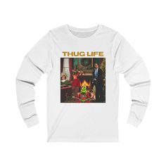 a white long sleeve shirt with the words thug life on it