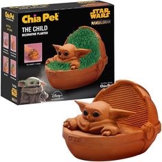 the star wars baby yoda is in an egg shell