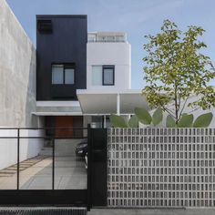 a modern house with black and white architecture