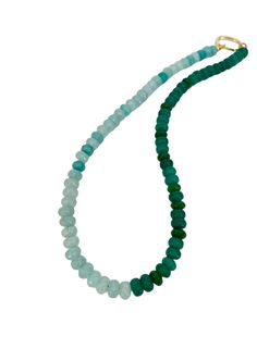 This necklace is a versatile and stylish piece of jewelry that offers three different looks in one design. Beautiful shades of green aquamarine and emerald rondelle jade beads are complemented by a circular gold clasp that allows for the addition of charms. The necklace measures approximately 17 inches in length. Rondelle beads are small, cylindrical-shaped beads with faceted surfaces, adding texture and dimension to the necklace. The combination of two shades of green creates a sophisticated an Green Rondelle Emerald Necklace, Green Single Strand Beaded Necklace In Amazonite, Green Emerald Single Strand Necklace, Green Rondelle Emerald Single Strand Necklace, Green Amazonite Single Strand Beaded Necklace, Green Hand-strung Rondelle Necklaces, Green Amazonite Single Strand Necklace, Green Polished Round Bead Necklaces, Green Hand-strung Round Beaded Necklace