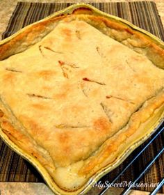 an apple pie sitting on top of a table