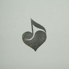 a musical note is drawn on the side of a sheet of paper