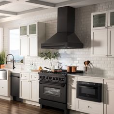 a kitchen with an oven, stove and dishwasher