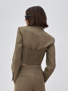 MO&Co. Women's Two Piece Cropped Blazer Features : - Short suit cut - Vintage peak lapelsCode : MBB3BLA004Length of size M is 42.5cmBrown : Model is 179cm tall and wearing a size M MATERIALS & CARE : Material : 64.5% Wool 35.5% PolyesterDo not wash, do not bleach Hang to dry, do not tumble dry Iron at low temperature, professional dry cleaning Do not expose to the sunPlease select your own size in the size chart according to your figure and serve model size as a guideline. Fitted Structured Suits For Spring, Fitted Khaki Suit For Work, Fitted Cropped Blazer With Pockets, Fitted Cropped Outerwear For Semi-formal Occasions, Fitted Structured Suit With Pockets, Tailored Khaki Blazer With Lapel Collar, Fitted Khaki Blazer For Work, Fitted Khaki Blazer With Notch Lapel, Fitted Chic Khaki Blazer