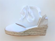 "Lace up, rope sole espadrille PUMP wedges (5cm heels = 1.97 inches) in WHITE with reinforcement stitching in the front. Antislippery soles covered with rubber. In order to prevent the fraying of the ribbons, the ribbon ends are glued, what makes a quite nice closing (see last pic for details). The comfiest wedge for walking! 👣 🦋 VEGAN SHOES, animal friendly & sustainable. Eco friendly. Jute fiber has excellent insulating properties and low thermal conductivity. It is environmentally frien White Lace-up Espadrilles With Woven Sole, White Adjustable Casual Espadrilles, Casual White Adjustable Espadrilles, White Espadrilles With Woven Sole, Adjustable White Closed Toe Espadrilles, White Adjustable Round Toe Espadrilles, White Lace-up Espadrilles For Summer, White Espadrilles With Round Toe, White Lace-up Espadrilles For Beach