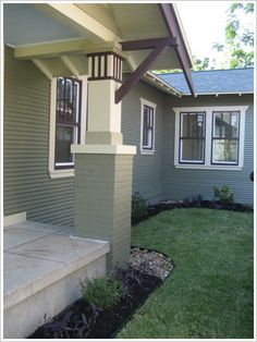 a house that has some grass in front of it