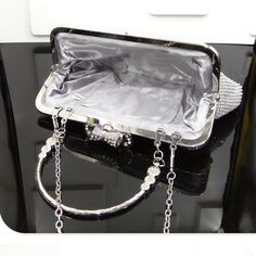 Item Type: Bags Material: Satin Lining Material: Polyester Length: 24 cm Width: 5 cm Height: 13 cm Decorations: Sequined Style: Evening Bags Clasp Type: Hasp Features: Bags, Women’s Bags, Luxury Bags, Evening Bags, Fashion Bags Silver Handheld Bag With Chain Strap, Rectangular Silver Evening Bag, Silver Large Capacity Shoulder Bag For Party, Silver Large Capacity Shoulder Bag For Evening, Silver Bags With Detachable Handle For Events, Silver Evening Shoulder Bag With Large Capacity, Silver Event Bag With Detachable Handle, Elegant White Bag With Rhinestones, Silver Event Bags With Detachable Handle