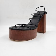 Gia Borghini X Rhw Rosie28 Knotted Platform Sandals Women'S 39.5/Us 9.5 Black~ Gia Borghini X Rhw Rosie28 Knotted Platform Sandals Women's 39.5/Us 9.5 Black Retail $630.00 Elevate Your Summer And Spring Wardrobe With These Gia Borghini X Rhw Rosie28 Platform Sandals. These Black Knotted Sandals Are Made Of High-Quality Calf Leather With Breathable Features, Making Them Perfect For Casual Occasions. The Open-Toe Design And Slingback Closure Add An Extra Touch Of Style To This Classic-Themed Party Sandals With Wooden Open Heel, Evening Block Heel Sandals With Wooden Detail, Evening Sandals With Wooden Block Heel, Luxury Sandals With Reinforced Heel For Spring, Designer Slingback Sandals With Wrapped Heel, Luxury Spring Sandals With Reinforced Heel, Luxury Sandals With Wooden Heel And Ankle Strap, Evening Slingback Sandals With Wooden Heel, Luxury Sandals With Padded Heel And Round Toe