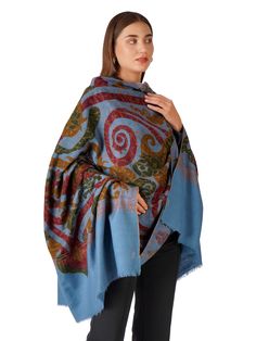 Experience the epitome of elegance and comfort with our Stylish Blue Pashmina Shawl, adorned with an intricate paisley design. This shawl is meticulously crafted from the finest Kashmiri pashmina, offering a luxurious blend of sophistication and timeless beauty. Product Details: Material: Pure Pashmina (100% Cashmere) Size: 100 cm X 203 cm / 40 Inch X 80 Inch / 1.1 x 2.2 Yards (Approx) Base Color: Blue Design: Intricate paisley pattern Origin: Handcrafted in Kashmir by skilled artisans Embroider Winter Pashmina Shawl With Paisley Print, Winter Paisley Print Pashmina Shawl, Pashmina Shawl With Paisley Print, Winter Pashmina Scarf With Paisley Print, Winter Paisley Print Pashmina Scarves, Winter Paisley Print Pashmina Scarf, Elegant Blue Paisley Print Scarves, Bohemian Blue Pashmina Shawl With Paisley Print, Blue Traditional Pashmina Shawl