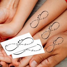 three people holding each other's hands with matching tattoos on their arms and wrist