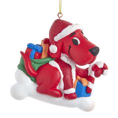 a christmas ornament with a dog on it's back and santa hat