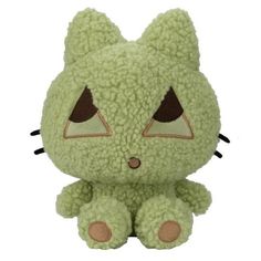 a green stuffed animal with big eyes