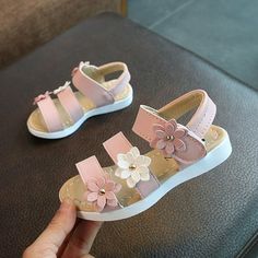 Children Girls Sandals Princess Open-toed Soft Bottom Flowers Roman Beach Shoes Description It is made of materials,Soft hand feeling, no any harm to your baby Lovely and Charming design available,Make your baby more lovely Shoe upper material: PU Sole material:Rubber Closure Type:Hook&Loop Style:Casual,Fashion,Party Package content:1 pair baby shoes( Including Shoebox) Note: Insole Length=Foot Length+0.8cm allow 1-3mm error due to manual measurement. If you are sure which size or other problems Flower Kids, Trainers Girls, Girls Basketball Shoes, Girls Tennis Shoes, Flower Girl Shoes, Princess Flower, Nike Shoes Girls, Beautiful Flower Designs