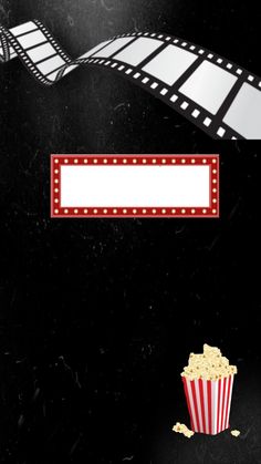 a popcorn bucket and film strip on a black background