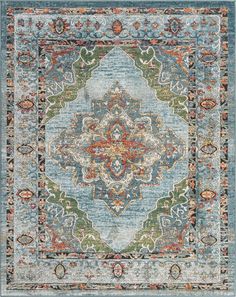 a blue rug with an ornate design on the top and bottom, in different colors