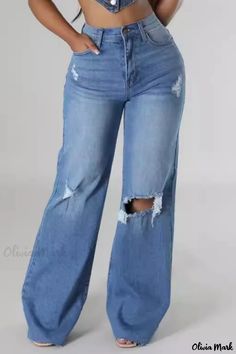 Olivia Mark - Premium High-Waisted Distressed Denim Jeans for a Casual Chic Look High Waist Ripped Jeans In Medium Wash, High Waist Ripped Light Wash Flare Jeans, High Waist Dark Wash Ripped Flare Jeans, High Waist Ripped Cotton Flare Jeans, Medium Wash Ripped Wide Leg Jeans, Non-stretch Distressed High Waist Jeans, Non-stretch High Waist Distressed Jeans, Distressed Non-stretch High Waist Jeans, Relaxed Fit High Waist Ripped Jeans