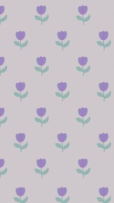 a pink and purple flower pattern on a white background with green leaves in the middle