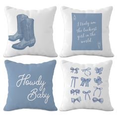 four pillows with blue and white designs for baby's first birthday, including cowboy boots