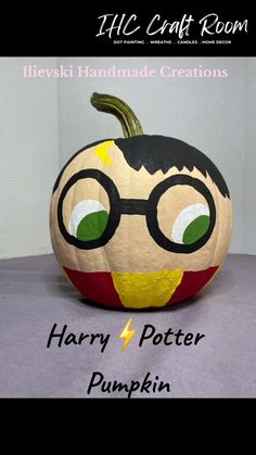 a pumpkin with glasses painted on it's face and the words harry potter pumpkin