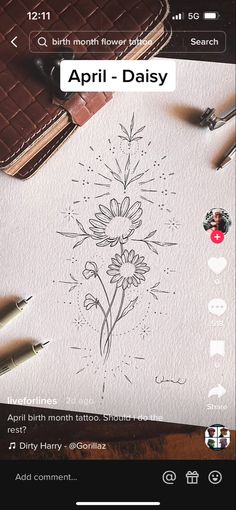 an image of a flower drawn on paper next to some pens and pencils with the words,'april - daisy '