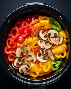 mushrooms, peppers and bell peppers in a pot