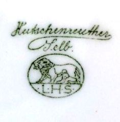 an image of a white plate with black writing on the front and bottom, which reads kurschenneuhe felt