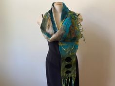 This is a hand-felted and eco-dyed silk and merino wool scarf. True art to wear. One-of-a-kind scarf. Great gift. Very textured. Easily hand washable. Artistic Hand Dyed Scarves, Wet Felting Scarf, Bohemian Hand-dyed Cotton Scarves, Wet Felted Scarf, Natural Dye Fabric, Bohemian Hand-dyed Multicolor Silk Scarf, Merino Wool Scarf, Fabric Scarf, Art Scarves