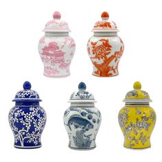 four different colored vases with designs on them in the shape of an urn